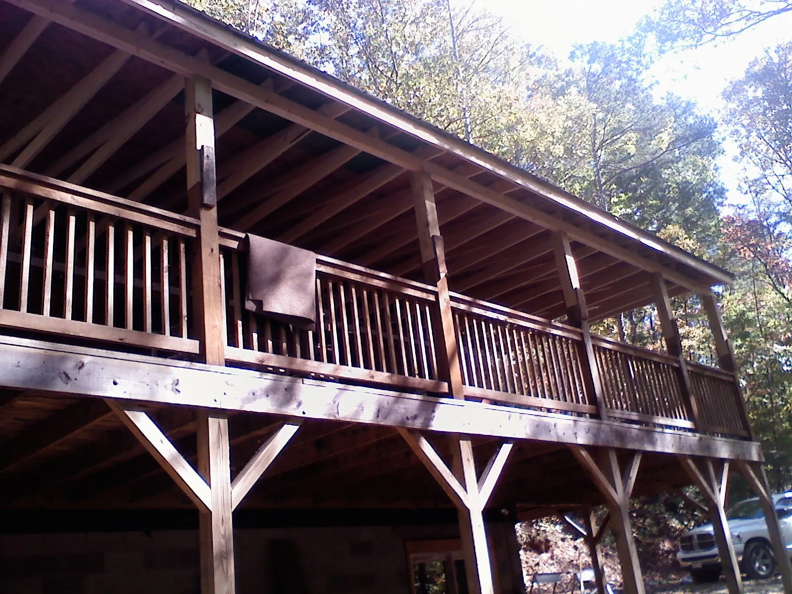 Timber framing under a new elevated porch and deck — Roof Leak Repair in Hillside by Roofing Brothers